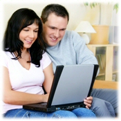 Couple doing a home search on-line
